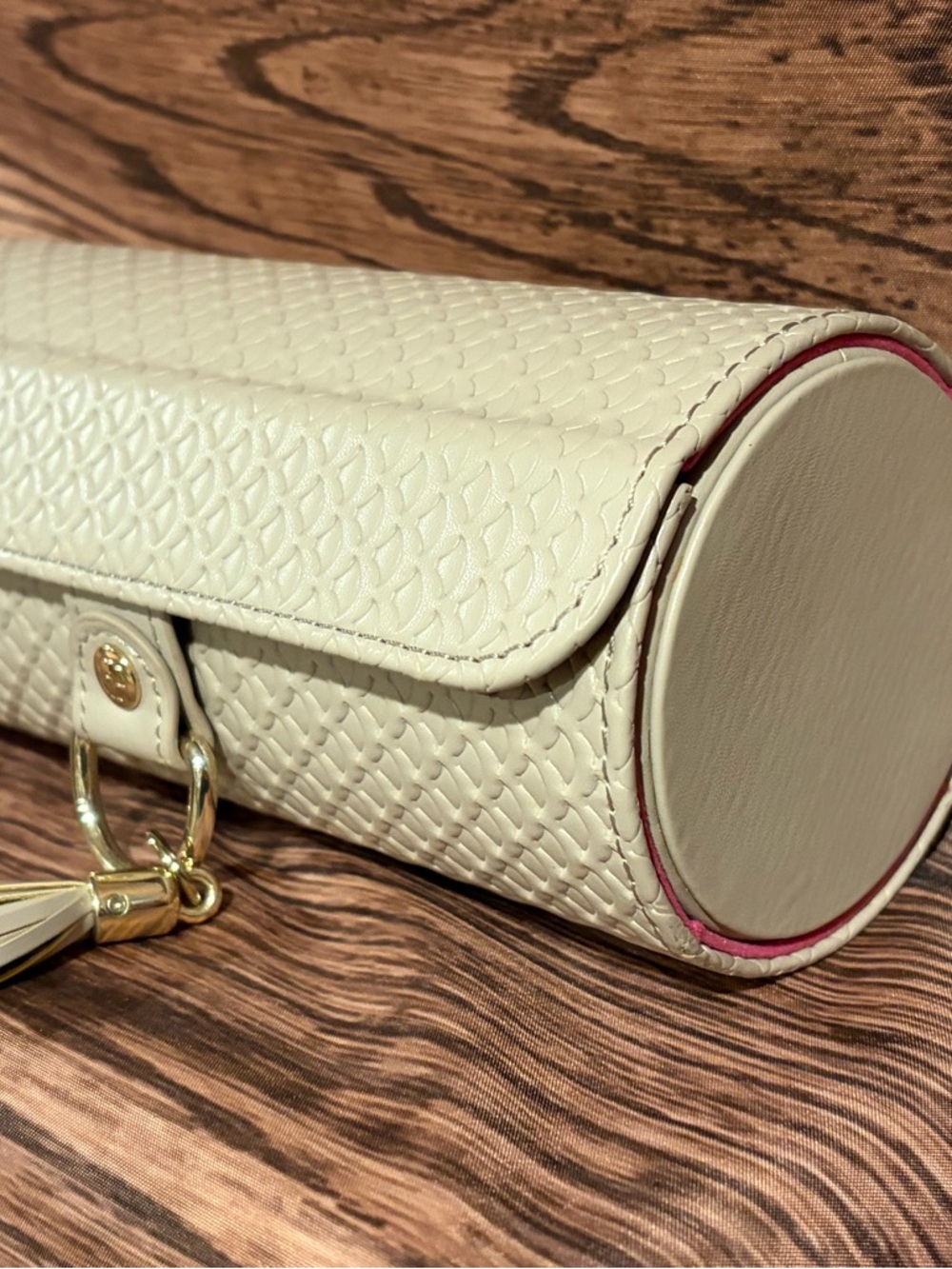 Cream Textured Cylinder travel jewelry Bag with Gold Hardware